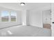 Inviting bedroom with a view, complete with plush carpeting and an open layout, offering relaxation at 16043 Meadow Frost Ct, Fishers, IN 46037