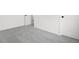 Bright bedroom features neutral walls and gray carpeting with white door frames at 16043 Meadow Frost Ct, Fishers, IN 46037