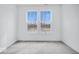 Bright bedroom featuring plush carpeting and a pair of windows that offer a scenic outdoor view at 16043 Meadow Frost Ct, Fishers, IN 46037