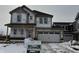 Two-story house with gray siding, white garage door, and dark roof at 16043 Meadow Frost Ct, Fishers, IN 46037