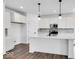 Modern kitchen featuring white cabinetry, an island with sink, and stainless steel appliances at 16043 Meadow Frost Ct, Fishers, IN 46037