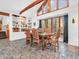 Elegant dining room featuring a wood table, leather chairs, and tile floors at 3499 Raspberry Ln, Nineveh, IN 46164