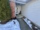 Front entry with brick and vinyl siding and walkway at 471 E Pine Ridge Dr, Westfield, IN 46074