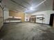 Garage with pegboard, shelving and workbench at 471 E Pine Ridge Dr, Westfield, IN 46074