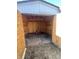 Empty storage shed with wood interior at 471 E Pine Ridge Dr, Westfield, IN 46074