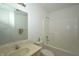 Bathroom featuring a bath and shower combination, and a sink with a large mirror at 5250 Shamus Dr, Indianapolis, IN 46235