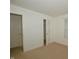Bedroom featuring a window and carpet; also featuring white doors and trim at 5250 Shamus Dr, Indianapolis, IN 46235