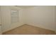 Bedroom featuring a window and neutral carpet; also featuring white walls at 5250 Shamus Dr, Indianapolis, IN 46235