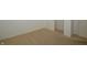 Neutral bedroom with carpet and white trim; also featuring a closet door at 5250 Shamus Dr, Indianapolis, IN 46235