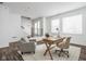 Bright and airy home office with hardwood floors and a wooden desk at 1825 N New Jersey St, Indianapolis, IN 46202