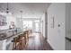 Modern kitchen with dark countertops, stainless steel appliances, and island seating at 1825 N New Jersey St, Indianapolis, IN 46202