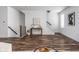 Spacious living room with hardwood floors and modern staircase at 1825 N New Jersey St, Indianapolis, IN 46202