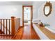 Upper hallway with wood floors, leading to bedroom at 4509 Madison Ave, Anderson, IN 46013