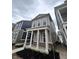 New two-story home featuring a covered front porch with classic columns and landscaping at 537 Gilder Dr, Carmel, IN 46032