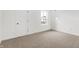 Bedroom with carpet, one window allowing natural light, and a door with a black handle at 20397 Hudson Bay Ln, Westfield, IN 46074