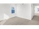Bright carpeted bedroom featuring a window with natural light and white walls at 20397 Hudson Bay Ln, Westfield, IN 46074