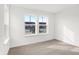 Cozy bedroom featuring plush carpeting, white walls, and double windows bringing in natural light at 20397 Hudson Bay Ln, Westfield, IN 46074