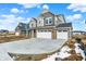 Stunning two-story home with a double garage, stone accents, and a spacious driveway in a residential area at 20397 Hudson Bay Ln, Westfield, IN 46074