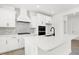 Bright kitchen featuring white cabinetry, modern appliances, and a large island at 20397 Hudson Bay Ln, Westfield, IN 46074