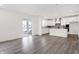 Spacious living area features an open layout and includes a modern kitchen with stainless steel appliances at 20397 Hudson Bay Ln, Westfield, IN 46074