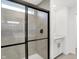 Stylish bathroom featuring tiled walls, glass shower door, and modern fixtures at 20397 Hudson Bay Ln, Westfield, IN 46074