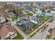 Aerial view showcases the blue house's location within the neighborhood and community at 323 E Franklin St, Shelbyville, IN 46176