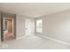 This bedroom features plush gray carpet, neutral walls, a closet, and a window at 6973 Oakdale Ln, Avon, IN 46123