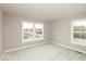 Light bedroom featuring soft carpet and natural light from the multiple windows at 6973 Oakdale Ln, Avon, IN 46123