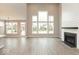 Bright living room featuring a fireplace, hardwood floors and tons of natural light at 6973 Oakdale Ln, Avon, IN 46123