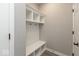 Mud room features built in cubbies, a bench, storage, and access to the garage at 6973 Oakdale Ln, Avon, IN 46123