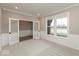 Carpeted office featuring panel molding, a double door entry and bright windows at 6973 Oakdale Ln, Avon, IN 46123