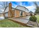 Home with brick siding and patio perfect for entertaining at 7330 Tousley Dr, Indianapolis, IN 46256
