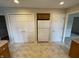 Kitchen with closet, refrigerator, and door at 7330 Tousley Dr, Indianapolis, IN 46256