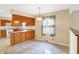 Eat in kitchen featuring tiled floor, breakfast nook, view to adjacent countertop and sink at 7330 Tousley Dr, Indianapolis, IN 46256