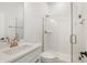 Bright bathroom featuring glass enclosed shower, white vanity, and stylish fixtures at 770 Leila Mae Ln, Westfield, IN 46074