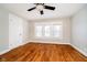 Bright bedroom with wood floors and ceiling fan at 1715 Union St, Indianapolis, IN 46225