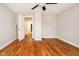 Bedroom with wood flooring and access to hallway at 1715 Union St, Indianapolis, IN 46225