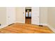 Bright bedroom with hardwood floors and access to other rooms at 1715 Union St, Indianapolis, IN 46225