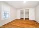 Well-lit bedroom with wood flooring and double closets at 1715 Union St, Indianapolis, IN 46225