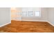 Spacious bedroom with wood floors and access to a closet at 1715 Union St, Indianapolis, IN 46225