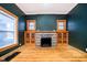 Living room with built-in shelving and fireplace at 1715 Union St, Indianapolis, IN 46225