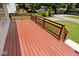 Spacious wooden deck with railings, perfect for outdoor enjoyment and entertaining guests at 6348 Kingsley Dr, Indianapolis, IN 46220