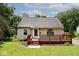 Charming single-story home with a front porch, lovely landscaping, and a well-maintained lawn at 6348 Kingsley Dr, Indianapolis, IN 46220