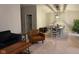 Bright dining room features a table with chairs, and is open to the living room at 9820 Legends Creek Dr # 208, Indianapolis, IN 46229
