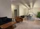 Bright dining room features a table with chairs, and is open to the living room at 9820 Legends Creek Dr # 208, Indianapolis, IN 46229