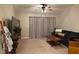 Relaxing living room with a large TV and comfy seating at 9820 Legends Creek Dr # 208, Indianapolis, IN 46229