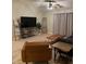 Living room features a large sectional sofa and sliding glass doors at 9820 Legends Creek Dr # 208, Indianapolis, IN 46229