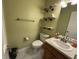 Cozy bathroom with unique industrial-style shelving and a bright, clean space at 11720 Grenadier Ln, Indianapolis, IN 46229