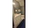 Bathroom featuring a white vanity, standard toilet, and traditional fixtures at 11720 Grenadier Ln, Indianapolis, IN 46229