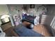A whimsical ' bedroom with unique decor, a cozy bed, and ample space for play at 11720 Grenadier Ln, Indianapolis, IN 46229